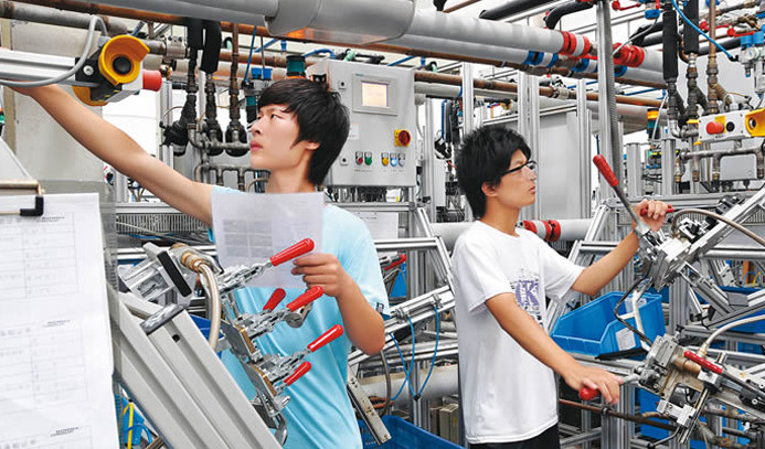 Çin'in imalat sektörü büyüdü