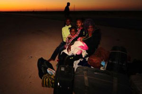 Libya'dan kaçan işçiler yardım bekliyor