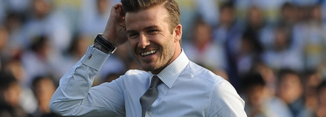 Beckham'ı görmek için birbirlerini ezdiler