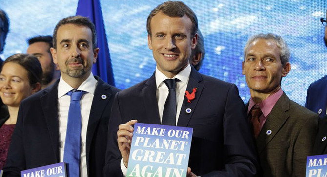 Trump'ın davet edilmediği iklim zirvesi Paris'te başladı