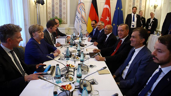 Erdoğan, Merkel'le görüştü