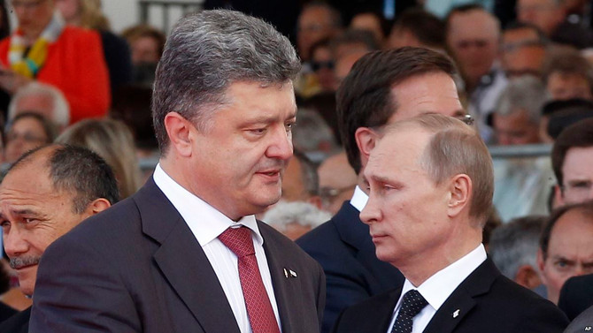 Putin, Poroşenko ile Ukrayna krizini görüştü