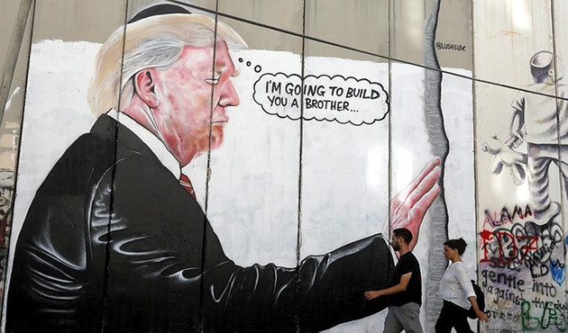 Ayrım Duvarı'nda Trump'a grafitili tepki