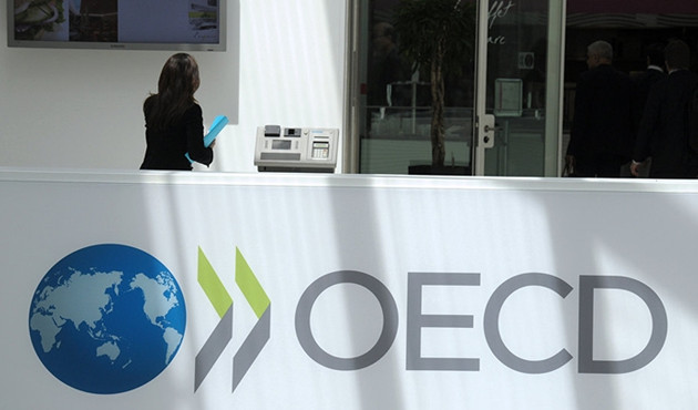 OECD küresel büyüme tahminini düşürdü