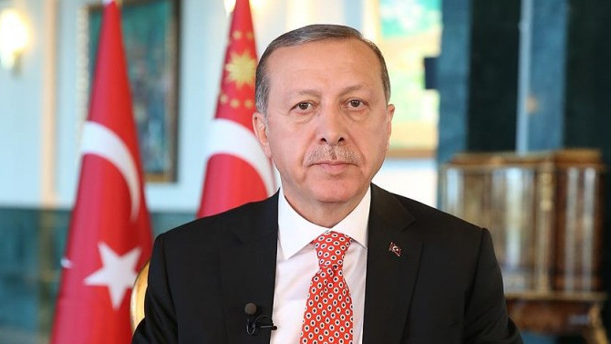 Erdoğan, Dursun Özbek'i kutladı