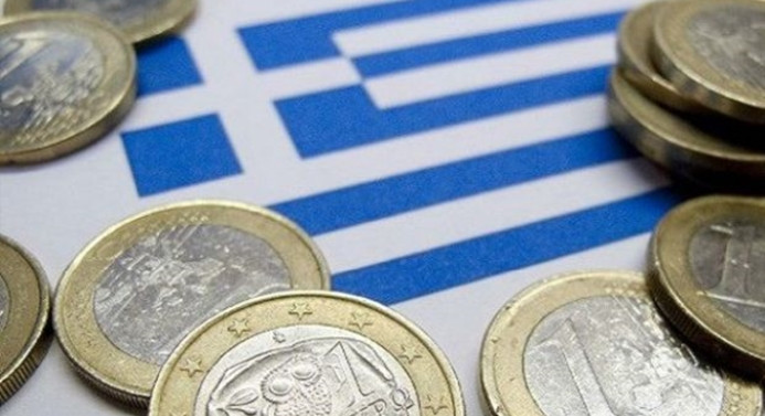 Yunanistan büyüme tahminini düşürdü